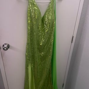 beautiful green prom dress with veils on each shoulder